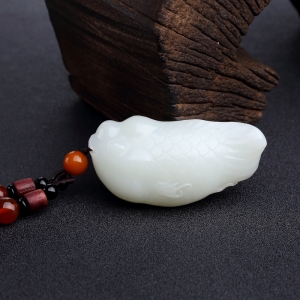 俄料白玉山料年年有余手把件