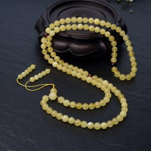 7mm鸡油黄金绞蜜108佛珠