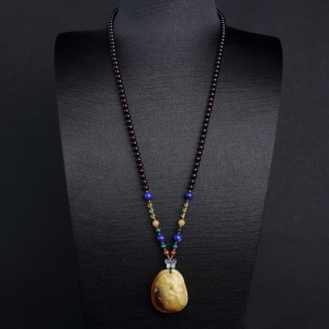 带皮鸡油黄蜜蜡钱袋项链