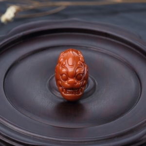 柿子红南红龙头戒面