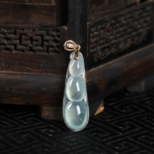 18K糯冰种飘花翡翠连中三元吊坠