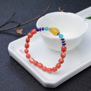 MOMO橘色珊瑚桶珠手链