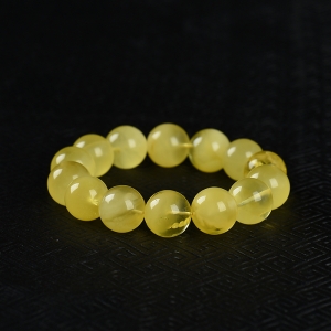 17.8mm鸡油黄金绞蜜手串