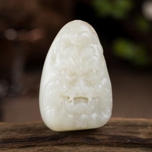 籽料和田白玉兽面手把件