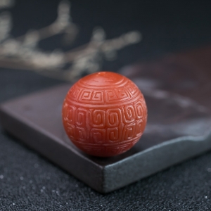 24.5mm柿子红南红回纹珠