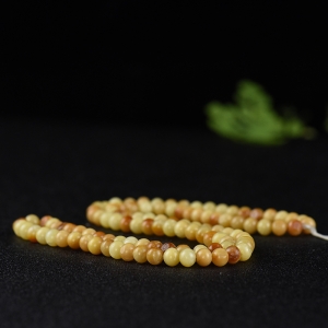 6.5mm籽料和田玉黄沁多圈手串