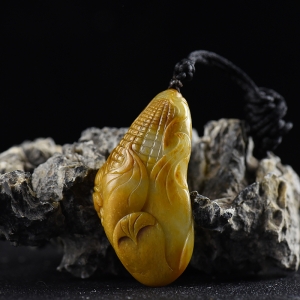 籽料和田玉黄沁多子多福手把件