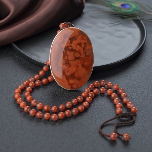 银镶火焰纹南红吊坠