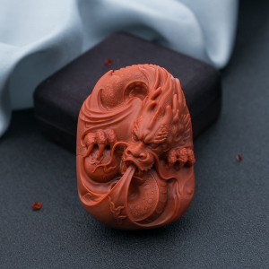 柿子红南红龙牌手把件