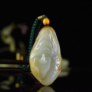 俏色籽料和田玉坐看风云手把件