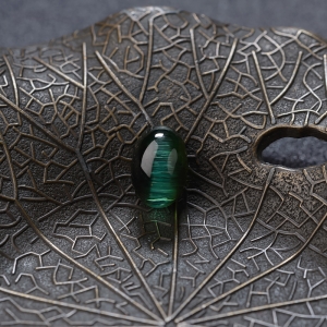 深绿色猫眼碧玺蛋面形戒面