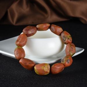 黄皮包浆料柿子红南红随形手串