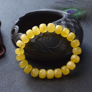 鸡油黄金绞蜜桶珠单圈手串