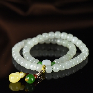 山料和田青玉老形珠多圈手串