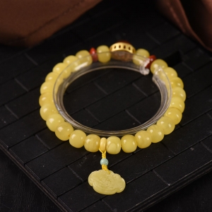 鸡油黄蜜蜡老形珠单圈手串