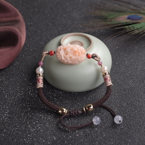 MOMO珊瑚雕花编织手串