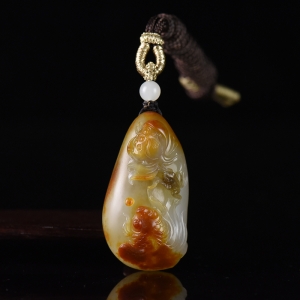 籽料和田玉聚红皮金玉满堂吊坠