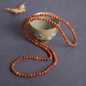 5.5mm铁皮包浆料南红多圈手串