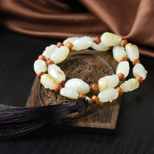 籽料和田白玉十八罗汉手持