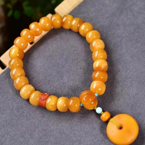 鸡油黄蜜蜡老形珠单圈手串