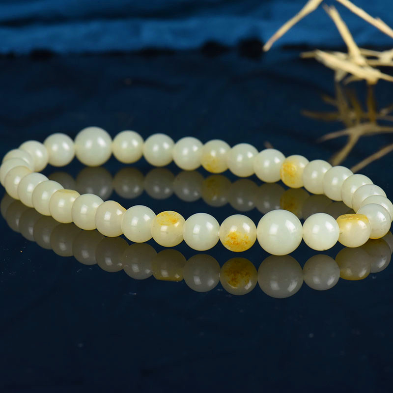 10mm籽料和田白玉手持