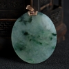 天然飘花翡翠圆牌吊坠-红掌柜