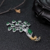 18K金镶钻翡翠孔雀胸针-红掌柜