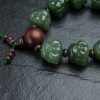 俄罗斯和田玉佛头手串-红掌柜