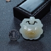 俏色和田玉兽头锁吊坠-红掌柜