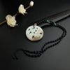 和田玉梅花圆牌吊坠-红掌柜