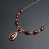 18K金镶钻阿卡黑牛血红珊瑚项链-红掌柜