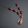 18K金镶钻天然黑牛血红珊瑚项链-红掌柜