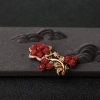 18K金镶钻阿卡珊瑚胸针-红掌柜