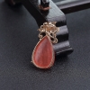 18K金镶钻阿根廷红纹石水滴吊坠-红掌柜