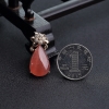 18K金镶钻红纹石水滴吊坠-红掌柜