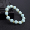 浅蓝绿松石回纹珠单圈手串-红掌柜