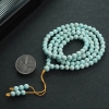 中高瓷铁线绿松石佛珠-红掌柜