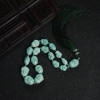 蓝绿绿松石佛头手持-红掌柜