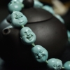 天然绿松石佛头手持-红掌柜