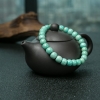 高瓷铁线绿松石桶珠单圈手串-红掌柜