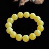 明黄色蜜蜡手串-红掌柜