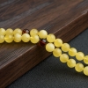 8.5mm鸡油黄金绞蜜佛珠-红掌柜