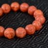 天然樱桃红南红佛头手串-红掌柜